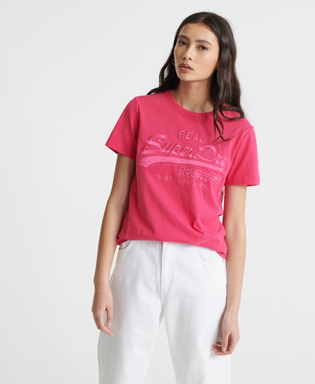 Superdry Vintage Logo Tonal Embroidery T-Shirt Superdry women's Vintage Logo tonal embroidery t-shirt. This classic short sleeved tee features a crew neckline, and is finished with a large embroidered Superdry logo across the chest.Slim fit – designed to fit closer to the body for a more tailored look