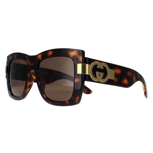 Gucci Square Womens Dark Havana with Gold Brown GG1688S  Sunglasses offer a perfect combination of modern sophistication and understated luxury. With their bold, square frame, these sunglasses make a striking fashion statement while maintaining a timeless appeal suitable for various occasions. The design is complemented by Gucciâ€™s signature double-G logo on the temples, adding a touch of iconic branding that speaks to the wearerâ€™s impeccable taste. High-quality lenses provide essential UV protection, ensuring comfort and safety without compromising on elegance.