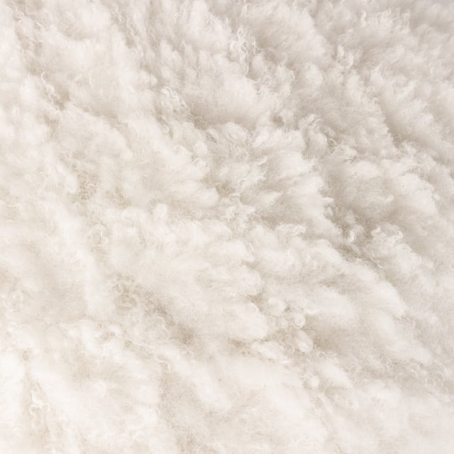 Give your room a bold boost. From dreamy cream for a neutral look to shocking shades that bring the drama, look no further. The Fluff Ball cushion is made from ridiculously soft faux fur statement fabric and is finished with a complementing velvet reverse. Perfect for those who love an injection of colour.