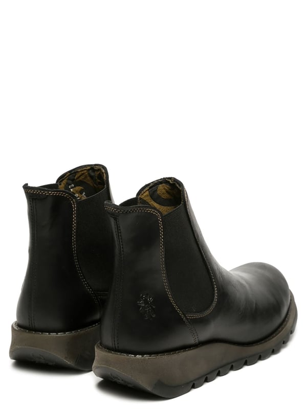 Las botas Chelsea de piel Salv195 para mujer de Fly London de la línea Sminx ofrecen un diseño elegante y práctico para el día a día. Con un estilo sin cordones, estas botas están confeccionadas con parte superior de piel de primera calidad, forro de microfibra y una cómoda plantilla de microfibra. La duradera suela de goma TR garantiza un soporte duradero, mientras que el tacón de cuña de 3,5 cm añade la altura justa para una elevación sutil. Perfectas para combinar con conjuntos informales o semiformales, estas botas Chelsea combinan comodidad y estilo atemporal. Parte superior: piel, forro: microfibra, plantilla: microfibra, suela: goma TR, altura del tacón: 3,5 cm, estilo sin cordones.