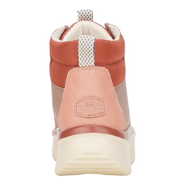 We have a high opinion of the Wendy Apres Coated Twill. Raise the style bar this season with a coated twill upper, suede heel and padded nylon collar. Fleece lining and an elevated platform height are giving total cushy comfort.