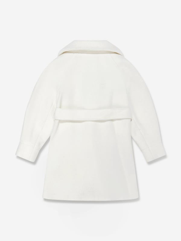 Californian label Mama Luma depict beautiful designs via their ethically sourced fabrics. This girls long ecru coat is reflective of the label's fine detailing and handmade construction. Made in a double breasted design with a belt, panels and side pockets ‚ Handmade ‚ 70% Polyester, 30% Wool‚ Cotton Lining