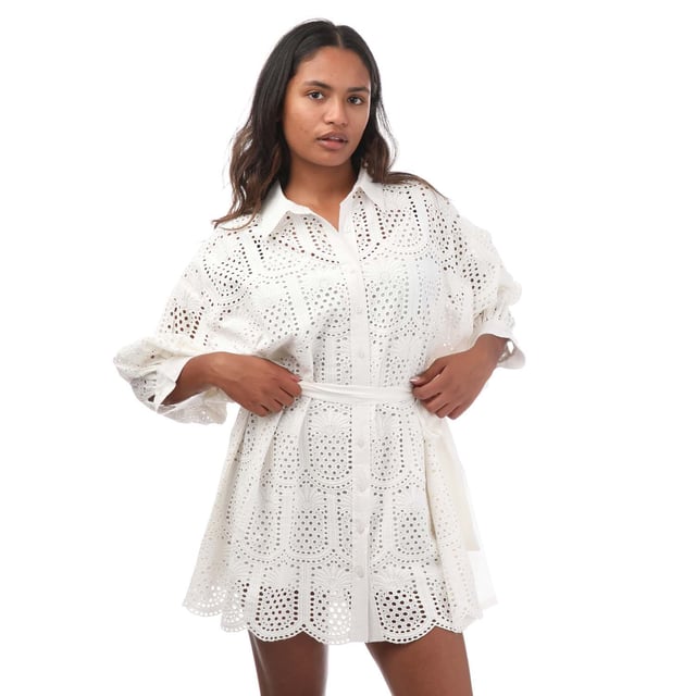 Women's Sundress Florine Short Dress in White.- Classic collar.- Flared sleeves.- Button fastening.- Shirt cuffs.- Pineapple eyelet patterned fabric.- Seperate belt to tie.- 100% Cotton. Ref: S24042.