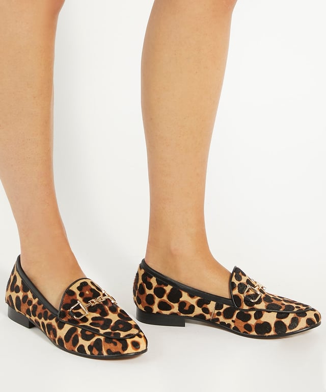 Dune Ladies Glair - Leather Snaffle Trim Loafers The timeless loafer is a Dune London signature. Meticulously crafted from premium leather, this traditional loafer profile features an elongated almond toe for a sleek silhouette. Finished with our signature interlocking DD snaffle, Glair is the perfect pairing with tailoring and will transcend seasons.