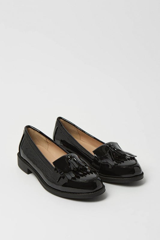 Whether you're dressing up for a formal occasion or looking to elevate your everyday style, this loafer is the perfect choice. Step out in confidence and make a statement with our timeless fringed tassel loafer.