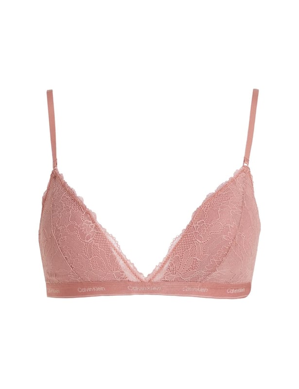 Calvin Klein Modern Lace Lined Triangle Bra Revolutionize your lingerie collection with the Calvin Klein Modern Lace triangle bra. Designed with a plunging neckline, this triangle bra is perfect for wearing under low-cut tops and dresses. The gorgeous lace cups add a touch of sophistication and femininity, making you feel truly fashionable. But that's not all – this bra is wireless and not padded for maximum comfort, giving you the freedom to move without any uncomfortable underwire digging into your skin. The moulded cups provide just the right amount of shaping and support, giving you a beautiful silhouette. And of course, it wouldn't be a Calvin Klein product without the signature waistband, adding a touch of designer to your underwear drawer. Adjustable shoulder straps ensure the perfect fit for your body, while the convenient hook and eye closure allows for easy wearing and removal. And let's not forget about the matching coordinates available, so you can complete your dream lingerie set.
Triangle bra
Plunging neckline
Gorgeous lace cups
Wireless for comfort
Non-padded
Moulded for shaping
Calvin Klein signature waistband
Adjustable shoulder straps
Hook and eye closure
Matching coordinates available
Country of origin: Indonesia
Composition: 80% Nylon | 20% Elastane
Listed in UK sizes
Non-Wired Bra