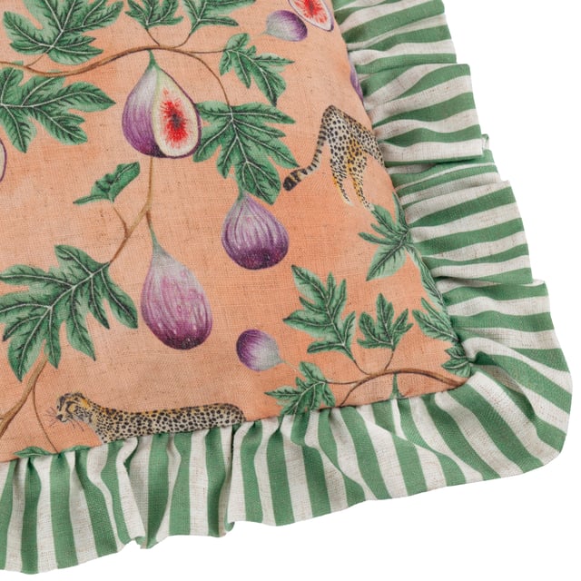 The Okara Leopard And Fig Printed Cushion encapsulates the perfect blend of modern design and nature-inspired artistry. Its hand-painted design brings a vibrant interpretation of the jungle’s charm, with painterly foliage, figs, and leopards exuding character and intrigue. The bold, textured print is framed elegantly by a striped double ruffle trim, adding a sense of dynamic contrast and sophistication. Designed for those who cherish pattern and the natural world, this cushion offers a statement piece that elevates both relaxed and maximalist interiors, seamlessly infusing contemporary spaces with an exotic yet refined aesthetic.