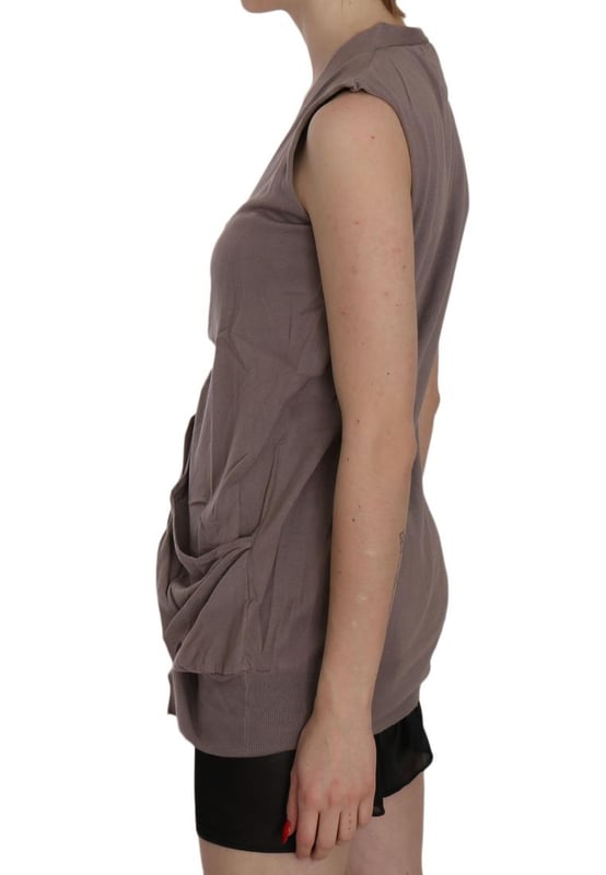 Brand: PINK MEMORIES
  Model: Sleeveless Cardigan Top
  Color: Brown
  Material: 100% Cotton
  One button closure
  Two front pockets
  Logo details