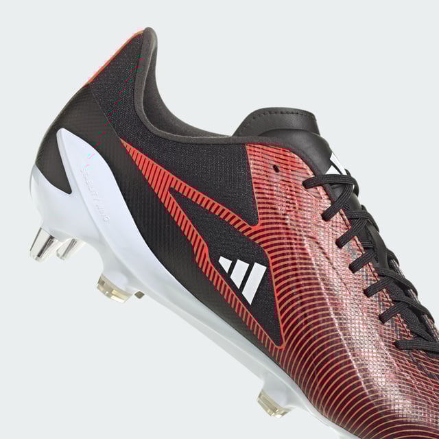Rapid in every direction. As the game gets faster, players need to respond in a heartbeat. Built for soft ground, these adidas RS15 Ultimate rugby boots keep things lightweight with a synthetic forefoot. Rigid stability wings, ripstop fabric in the rearfoot and foam Sensepods in the heel ensure you stay strapped in for sprints. On top, asymmetrical lacing and 3D-printed elements help produce accurate kicks. Underneath, a Speedframe outsole adds biting traction.Made with a series of recycled materials, this upper features at least 50% recycled content. This product represents just one of adidas' solutions to help end plastic waste.  - Regular fit - Lace closure - Soft synthetic upper - Cushioned heel pods - Moulded stability wings - Speedframe outsole - Upper contains a minimum of 50% recycled content  Shipped by adidas