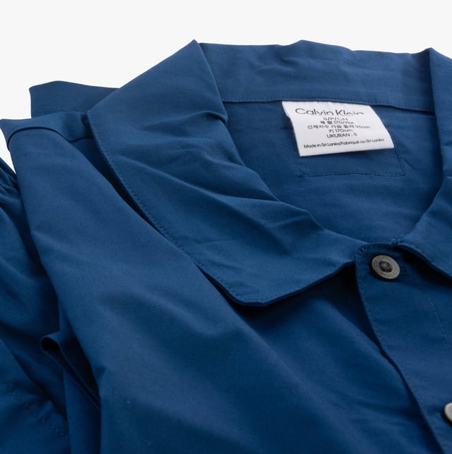 Calvin Klein PURE COTTON SLEEP Short Pyjama Set Mens Navy Peony Calvin Klein Calvin Klein PURE COTTON SLEEP Short Pyjama Set Mens Navy Peony
Closure/Fastening: Button
Features: Comfort,Breathable
Item Weight: 0.25 KG
Clothing Fit: Regular
Single Or Multi Pack?: Single
Gift Boxed: No
Material Composition: 74% Cotton, 24% Recycled Cotton, 2% Elastane
Clothing Features: 2-Piece Set | Side Seam Pockets | Elasticated Waistband
Product Code: 000NM2499ECHU