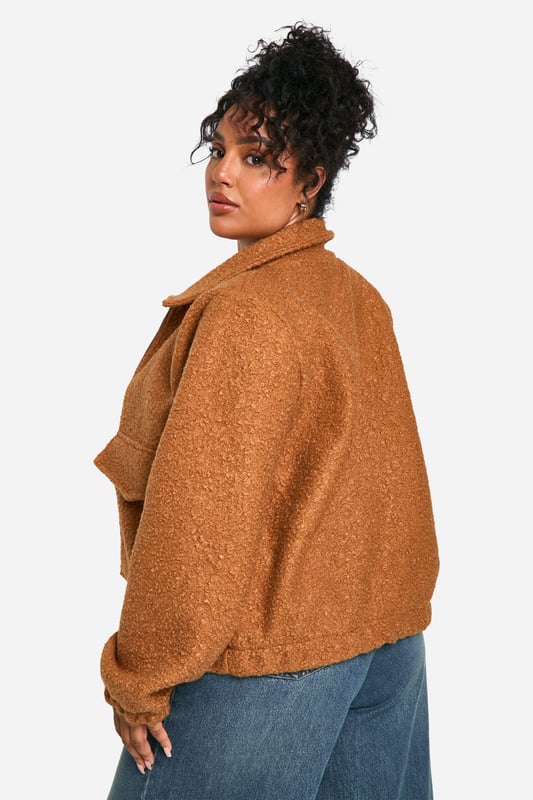 Add the finishing touch to your outfit with this outerwear piece from our women's plus size coats range. A wardrobe staple that's perfect for layering, this style provides added warmth and adds an extra something to your fit. Made with added fabric for the perfect fit, this piece is a whole vibe - just throw on over your fave outfit and you're sorted. Whether you choose a plus size denim jacket or keep things cosy in winter with a plus size teddy coat we've got the hottest coats for curvy girls that are always on-trend. Style: Bomber JacketNeckline: Collared