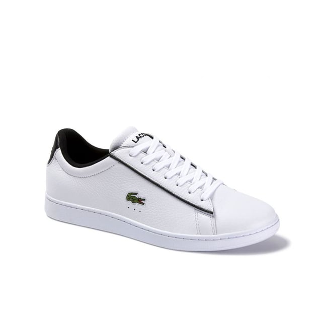 Lacoste Carnaby Evo 120 2 SMA Mens White Trainers These trainers effortlessly blend classic design elements with contemporary flair, making them a versatile choice for any modern gentleman.
Crafted with a premium white leather upper, these trainers showcase the brand's commitment to quality and attention to detail. The clean and sleek design is complemented by subtle perforated detailing, adding a touch of texture and visual interest.
The low-top silhouette offers a refined and versatile look that easily pairs with various outfits, from casual to semi-formal. The iconic Lacoste crocodile logo on the side adds a signature touch, representing the brand's heritage and timeless style.
Equipped with a cushioned insole, these trainers provide exceptional comfort and support for all-day wear. The lace-up closure ensures a secure and adjustable fit, while the padded collar adds an extra layer of comfort around the ankle.
Built for both style and functionality, these trainers feature a durable rubber outsole that offers reliable traction on different surfaces. Whether you're strolling through the city or enjoying a casual outing, these trainers provide stability and grip with every step.
Embrace the effortless elegance of the Lacoste Carnaby Evo 120 2 SMA Men's White Trainers. Whether you're dressing up for a special occasion or adding a touch of sophistication to your everyday look, these trainers are the perfect choice. Step into refined style and enjoy the combination of comfort, quality, and timeless design that Lacoste is renowned for.