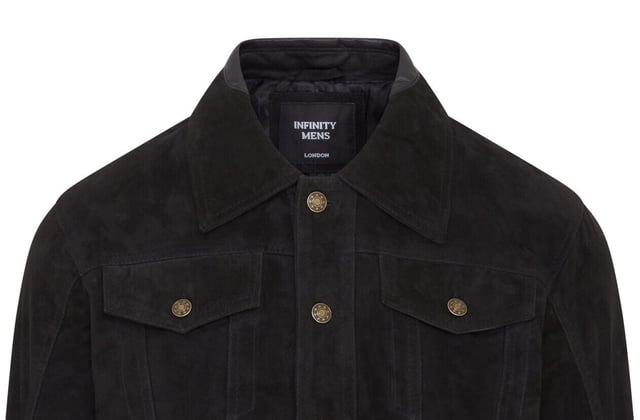 Introducing the Men's Trucker Casual Goat Suede Leather Shirt Jeans Jacket. This stylish, denim-inspired shirt is reimagined in the softest goat suede leather, offering a luxurious feel with a nod to 70's Americana. The slim-fit design makes a bold style statement, while the press button fastening, adjustable waistband, and cuffs add comfort and versatility. Perfect for pairing with your favorite jeans and boots, this retro jacket combines classic and contemporary effortlessly.

Slim fit for a modern silhouette
Press button fastening for easy wear
Adjustable waistband and cuffs for customized comfort
Soft goat suede leather for a luxurious feel
Inspired by 70's Americana for a timeless style