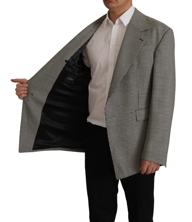 100% authentic Dolce & Gabbana Gray Checkered Wool Blazer
  New with tags
  Single breasted with notch lapels
  Made in Italy
  Gray checkered color
  1 button fastening
  Logo details
  Material: 100% virgin wool
  Lining: 100% Silk
Material: 100% Virgin Wool