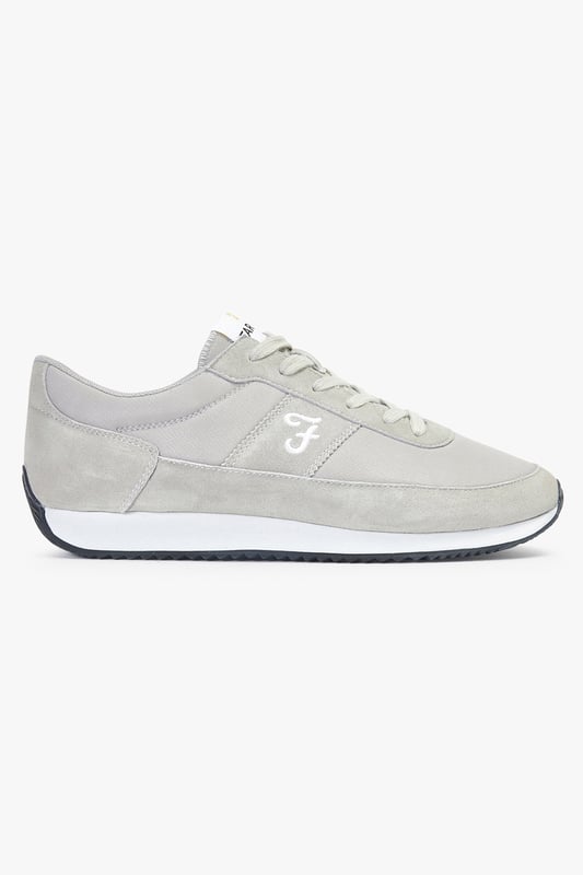 Farah Light Grey 'Leon' Casual Lace Up Trainers Level up your look this season with these runner style trainers from Farah. These shoes feature a canvas upper with faux suede panels, a Farah logo tongue detail, contrast rubber sole and an embroidered Farah logo on the side of the shoe. In a sleek, sporty silhouette, these trainers are the perfect addition to your new season wardrobe. Available in other colours.