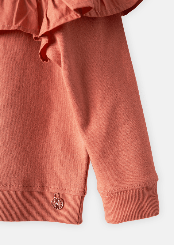 Putting an A&R twist on the humble sweatshirt. Pretty self colour woven frill on a soft canyon rose base. A wardrobe staple but by no means boring..  . About me: 60% Cotton 40% Polyester. Look after me: Think planet. wash at 30c.