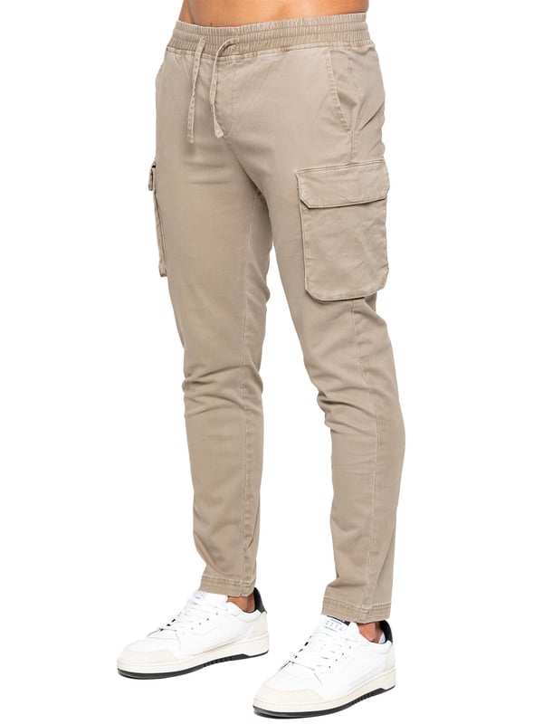 Enzo Mens Cargo Trousers. Regular Fit, Straight Leg, Enzyme Wash. 5 Pocket Design. 2 Side Pockets, 2 Cargo Pockets With Velcro Fastening. Single Back Welt Pocket. Elasticated Waistband With Adjustable Drawstring