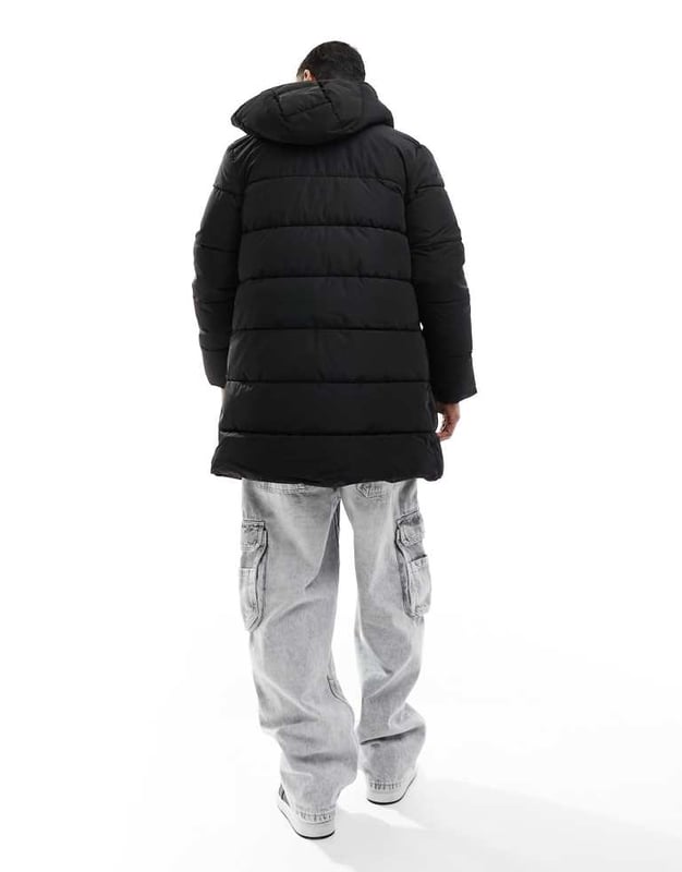 ONLY & SONS longline hood puffer jacket in black Jackets & Coats by Only & Sons Head-to-toe warmth Toggle hood Zip fastening Side pockets Longline cut Regular fitSold By: Asos