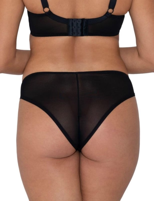 Introducing the new Eye Spy range by Curvy Kate, a fun and playful addition to your lingerie drawer! The Brazilian style brief contrasts delicate lace and sheer mesh to create a sexy look and feel for any time of day. Moderate rear coverage provides a flattering look with a hint of seductiveness which allows for adaptability. Pair with the matching balcony bra from the Eye Spy range for a perfect look.  Playful, feminine design, Comfortable and contemporary fit and feel, Sexy Brazilian style brief with contrast lace panels, Minimum to moderate rear coverage, Matching items available, Listed in UK sizes.   Brazilian Brief
