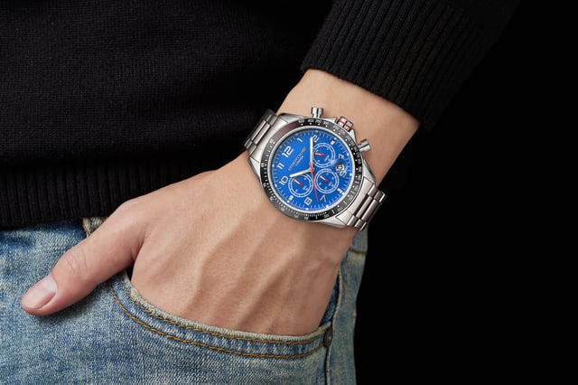 The Hand Assembled Anthony James  Tachymeter Chrono Steel Blue men’s watch boasts an array of exceptionally stylish and contemporary features ideal for gentlemen looking to enhance their look. The Quartz movement works the silver hour and minute hands that glow with white luminous features and are fitted against the sleek pacific-blue dial with UP indexes. The silver alloy case is enhanced by the Tachymeter bezel to easily measure your speed based on time and distance travelled, while the 202 stainless steel bracelet with wrapped links and a secure folded clasp and 304 stainless steel caseback provide the finalising details.
Quartz movement PE902
 Alloy case
Tachymeter Bezel with aluminium insert
3ATM Water resistant
 304 stainless steel caseback with snap-in
construction.
 Front mineral lens(bubble glass). 
Blue dial with UP indexes. 
Silver hour/minute hands with white luminous.
 202 stainless steel bracelet with wrapped links and folded clasp. 
Silver flash plating

Watch Dimensions:
Case Diameter- 43 mm
Case Thickness- 13.2 mm
Lug width- 20.1 mm
Strap width- 20 mm
Strap length- 178 mm
Weight- 130 grams