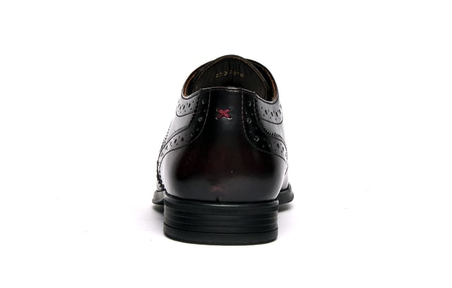 With expert craftmanship, a hi-shine leather upper, and classic brogue detailing, the Catesby England Wentworth delivers vintage styling that is sure to elevate any outfit and is a timeless essential for the fashion-forward mans wardrobe. The Wentworth is complete with a classic lace up system, durable outsole with a slight raised heel, and subtly cushioned insole for a brogue that combines style and comfort to deliver a standout design.
 - Premium hi-shine leather upper
 - 5-hole lace closure
 - Intricate stitch and punch-hole detailing
 - Durable outsole  - Authentic vintage styling
 - Catesby England branding