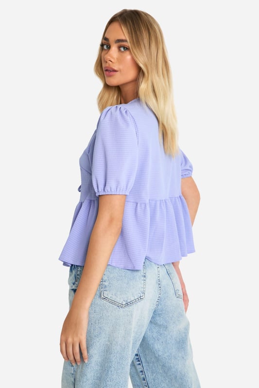Look hot in this pretty smock top, fresh from our latest arrivals. Made from gathered fabric that's designed to stretch, a smock top is skin tight at the top and falls loosely for a flattering fit on all shapes and sizes. Cut to a practical shape, effortless style is made easier with a smocked blouse or top, the perfect throw-on piece you can team with jeans for everyday wear. From laidback crew necks to criss-cross backs, our latest edit is full of fun laid back pieces - choose yours today.Style: Smock TopLength: RegularSleeve Length: Long Sleeve