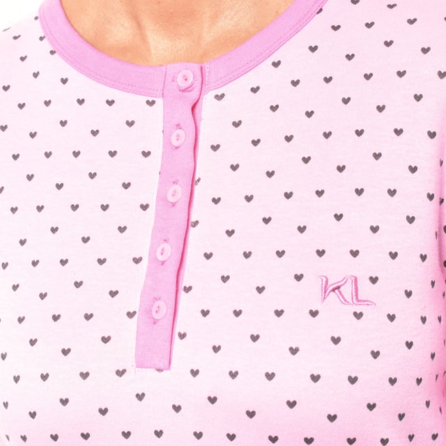 Kisses&Love women's winter pajamas. Top quality winter pajamas!

 The women's pajamas combine a long-sleeved round-neck T-shirt and long pants.
 Made of soft and breathable materials, it ensures comfort throughout the night.
 Ideal for autumn/winter, this set offers a perfect balance between style and comfort for a restful night's sleep.

 Exclusive designs and a variety of prints: Women's winter pajamas are available in a wide range of exclusive designs and prints, allowing you to choose from different styles that reflect your personality and taste. From prints to stripes, each pajama offers a unique and special touch.

 Easy Care & Durability: Made from durable cotton, the women's pajamas are easy to machine wash and maintain their softness, color, and shape wash after wash. This easy maintenance ensures that the pajamas remain a favorite item in your wardrobe, offering durability and practicality over time, especially during the colder seasons.

 Women's winter pajamas, the perfect gift for Mother's Day, anniversary, Christmas, New Year, birthday, and much more!

 Choose style, quality and comfort with Kisses&Love!
 Composition: 100% Cotton
 Care:
- Wash at max temperature. 30º.
 - Do not use bleach.
 - Do not use a dryer.
 - Iron at low temperature max. 110º.
 - Do not dry clean.