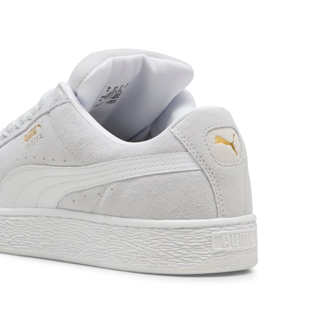 PRODUCT STORY: This fresh take on the classic Suede draws inspiration from PUMA’s heritage within breakdancing and its influence on modern streetwear. The Suede XL retains the Suede’s iconic DNA, but gives it a twist with an exaggerated padded collar and tongue, plus a chunkier sole. This execution features a full suede upper with a leather Formstrip. FEATURES & BENEFITS: PUMA’s leather products support responsible manufacturing via the Leather Working Group.www.leatherworkinggroup.com. DETAILS: Suede upper; Leather Formstrip; Suede tongue with mesh binding; Debossed and foil-printed PUMA branding on quarter panel; Mesh lining; Mesh sockliner; Rubber midsole; Rubber outsole; Lining: Textile, Other; Outsole: Rubber; Upper: Leather; Sockliner: Textile.
