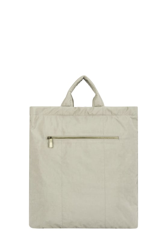 Made from our signature nylon, the Portrait Nylon Tote is the perfect way to carry all your everyday essentials. Featuring a padded carry handle and adjustable crossbody strap with a clip off function. Features: , Zip top opening, Front oversized flap over zip pocket, Rear zip pocket, SMITH & CANOVA antique brass logo, Branded antique brass zips, Padded grab handle, Adjustable crossbody strap (detachable), Internal 15 inch padded laptop sleeve, Internal zip pocket, 2 Internal mobile phone slip pockets - fits normal and plus size smart phones, 2 Internal pen slip pockets Style Ref: 92682 STONE