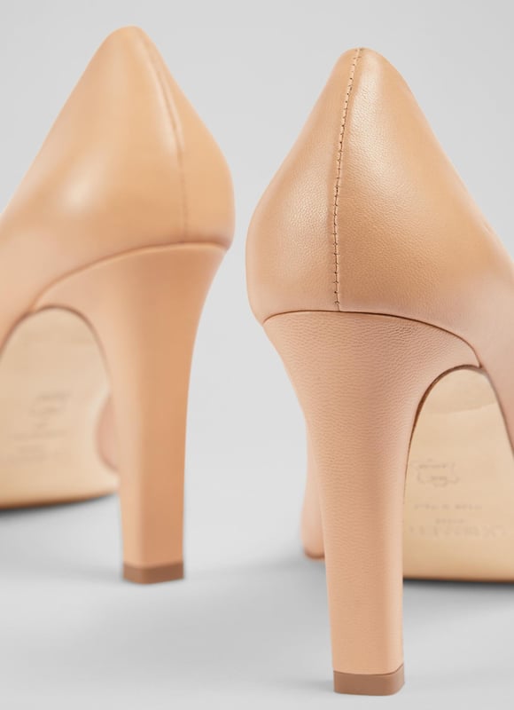 A high-heeled court with chic detailing, our Evelyn courts feel a little dressier than the classic styles. Beautifully-crafted in Italy from buttery camel leather, they have a round toe, a gold eternity ring embellishment - which is exclusive to LKB - a sleek shape and an elegant stiletto heel. Wear them to work or for spring occasions.