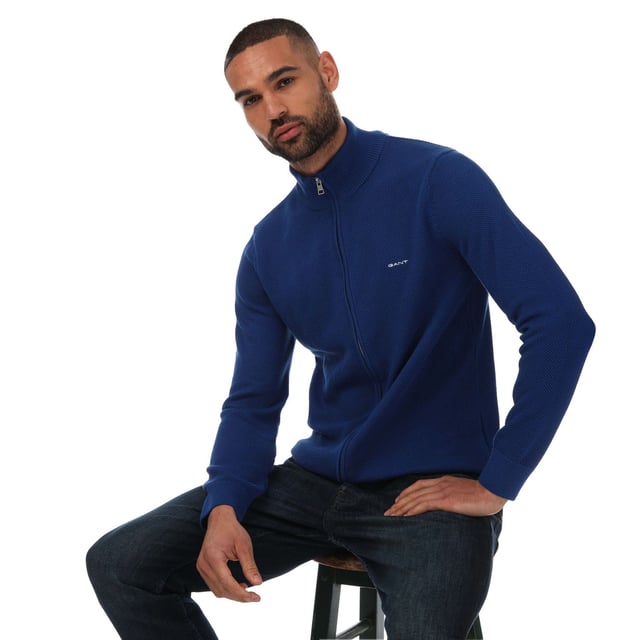 Mens Gant Cotton Pique Zipped Cardigan in blue.- Full zip fastening.- Ribbing at hem and sleeve cuffs.- Contrast stripe detail on inside neck rib.- GANT logo embroidered at chest.- Relaxed fit.- 100% Cotton.  - Ref: 8040524436