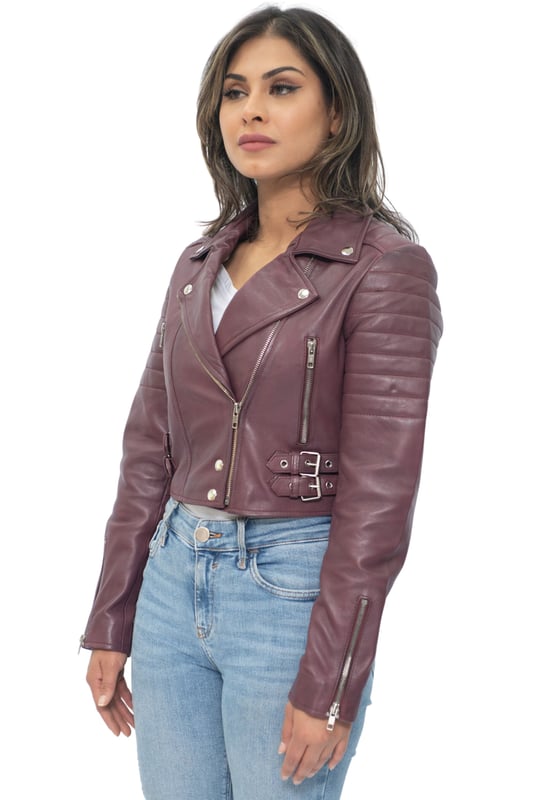 This jacket is made of ultra-soft leather and finished in our premium nappa which sports a contemporary cropped length and form fitting design. We’ve introduced features such as quilted shoulders and extended vertical zip pockets with the intention to give this jacket a distinctive chic look. To ensure comfort when wearing our jacket, we’ve introduced zipped cuffs that allow you to roll the jacket sleeves up and a buckle adjustable waist for tightening to achieve your desired look and feel. In classic Brando style this jacket features a wide notched lapel which has been a staple addition for adding flair to any jacket style. • 100% premium ultra-soft nappa leather • Premium Satin lining • Furnished with off centred YKK zip fastening and wide notched lapel • Features 2 zipped exterior pockets and quilted detailing.