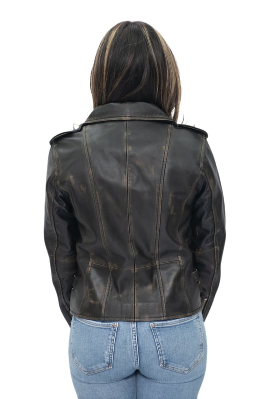 This double-breasted biker jacket is one our best sellers due to its sleek features and silhouette which create a distinctly stylish appearance. The jacket front is furnished with a variety of zip pockets for added storage and characterisation, and additionally features a flamboyant wide notched lapel and shoulder epaulettes both of which can be fastened down with press studs. Buckle tabs are featured at the hips for added comfort and to create a tapered appearance that is complimented by the slim fitting and shortened design of this jacket. We feature this jacket in a huge variety of colours so that you can pick this piece up in whatever style suits your preference. • 100% premium ultra-soft nappa leather • Premium Polyester blend lining • Furnished with off centred YKK zip fastening and wide notched lapel • Features 6 zipped exterior pockets and adjustable buckle tabs at the hips.