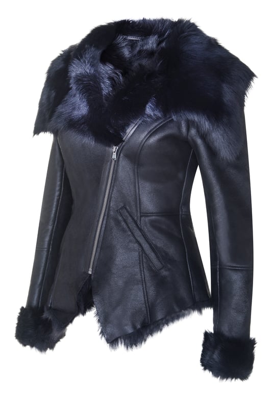 Indulge in luxury and sophistication with our Women's Toscana Leather Jacket. This exquisite piece features a double-breasted design with an asymmetric zip, creating a contemporary and stylish silhouette. The two slanted welt pockets at the hip offer convenience and a touch of elegance. The raw-cut edges of the collar and facing add a modern and edgy vibe to the jacket. Crafted from genuine Toscana lamb skins, the jacket ensures superior quality and utmost comfort. The zip extending to the top of the collar adds versatility and allows for different styling options.  • Double-breasted design with an asymmetric zip for a modern and stylish look • Slanted welt pockets at the hip for convenience and elegance • Raw-cut edges on the collar and facing for a contemporary and edgy touch • Made from genuine Toscana lamb skins for exceptional quality and comfort • Zip extending to the top of the collar for versatile and personalized styling.