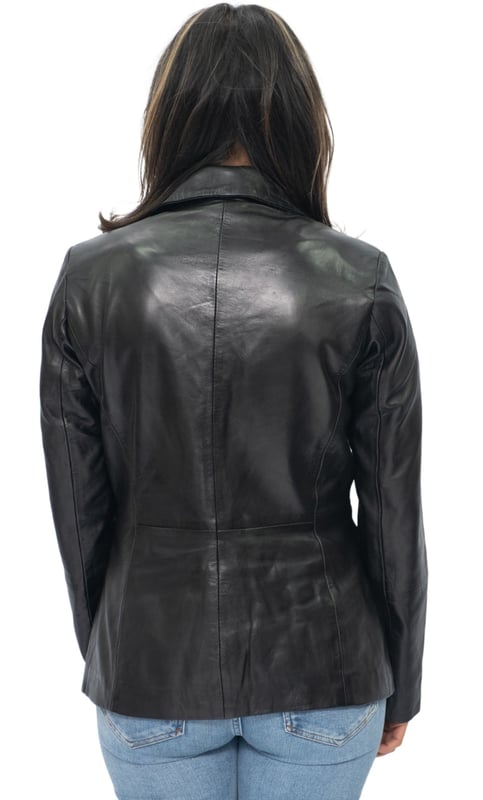 Elevate your style with our Women's Leather Blazer Jacket. Crafted from soft and supple lambs nappa leather, this jacket offers a luxurious and comfortable feel. It features two exterior waist pockets for a touch of functionality and added style. Available in two stunning colours, this jacket allows you to express your personal taste. The collar showcases notched lapels, adding a sophisticated touch to the overall design. With a one-button closure, this blazer-style jacket exudes elegance and versatility. Whether you're heading to the office or going out for a night on the town, our women's leather blazer jacket is the perfect choice.  • Soft and supple lambs nappa leather construction • Two exterior waist pockets for a touch of functionality • Available in two stunning colours • Notched lapels on the collar for a sophisticated look • One-button closure for elegance and versatility.