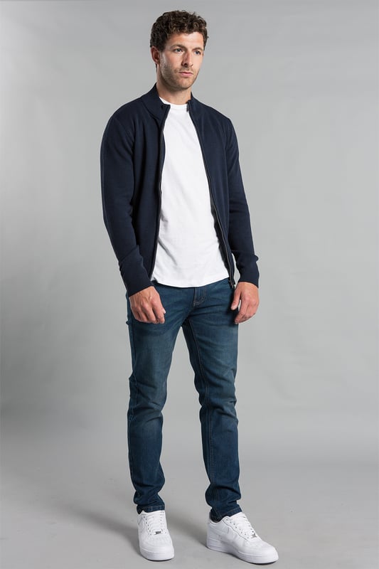 This cardigan from Kensington Eastside is perfect for any wardrobe. This cardigan features ribbed elasticated details on the funnel neck, cuffs, and hem and has two zipped side pockets. This cardigan is made from cotton blend fabric to ensure comfort, making it perfect for staying warm.