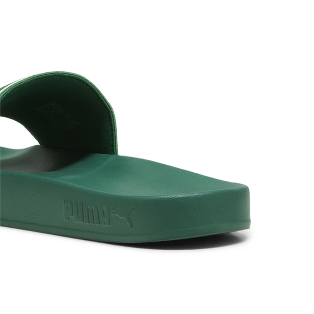 PRODUCT STORY: Summer is coming, and these slides are the footwear you need to see you through the season. The fresh, modern design takes your casualwear look to the next level – but these slides are as much about substance as style. A padded leather strap and moulded footbed ensure supreme comfort, while the outsole provides grip and traction on wet surfaces, so you’ll be prepared for anything whether you're hanging out at home or lounging around the pool. FEATURES & BENEFITS:  CMEVA: PUMA's compression-moulded EVA material for lightweight performance DETAILS:  Padded synthetic strap; Moulded CMEVA outsole for grip and durability; PUMA branding