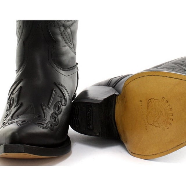 Featuring hand crafted premium leather on the oily black upper and on the inner lining, this pair of boots offers a great amount of style and comfort. A high-quality detailed pattern is stitched on to the upper and a 1.5” stacked Cuban heel is introduced to compliment the high boot design. This boot was manufactured with a Grinders proprietary sole unit, that has been heat bonded to the welt using the Goodyear method, which is known for increasing the strength of the boot and ensuring durability for years to come. The sole is also fitted with a unique air cushion that allows for added flexibility and which adds to the long-lasting qualities of this boot. • Oily black leather upper • Goodyear Welted sole unit • Luxurious interior leather lining • Stacked 1.5” leather heels • Leather Soles • Made in Mexico