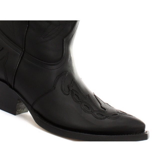 Featuring hand crafted premium leather on the oily black upper and on the inner lining, this pair of boots offers a great amount of style and comfort. A high-quality detailed pattern is stitched on to the upper and a 1.5” stacked Cuban heel is introduced to compliment the high boot design. This boot was manufactured with a Grinders proprietary sole unit, that has been heat bonded to the welt using the Goodyear method, which is known for increasing the strength of the boot and ensuring durability for years to come. The sole is also fitted with a unique air cushion that allows for added flexibility and which adds to the long-lasting qualities of this boot. • Oily black leather upper • Goodyear Welted sole unit • Luxurious interior leather lining • Stacked 1.5” leather heels • Leather Soles • Made in Mexico