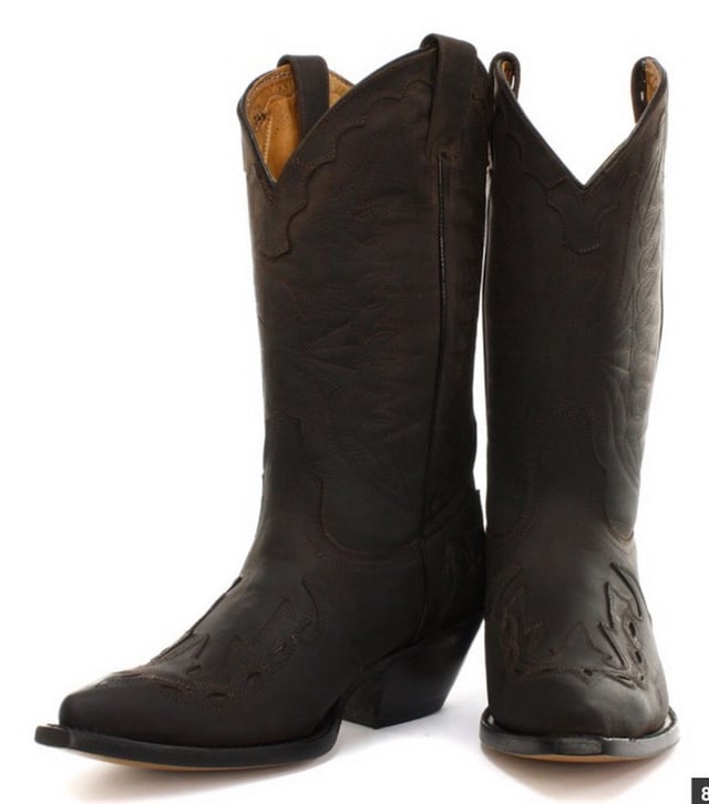 Featuring hand crafted premium leather on the brown upper and on the inner lining, this pair of boots offers a great amount of style and comfort. A high-quality detailed pattern is stitched on to the upper and a 1.5” stacked Cuban heel is introduced to compliment the high boot design. This boot was manufactured with a Grinders proprietary sole unit, that has been heat bonded to the welt using the Goodyear method, which is known for increasing the strength of the boot and ensuring durability for years to come. The sole is also fitted with a unique air cushion that allows for added flexibility and which adds to the long-lasting qualities of this boot. • Oily black leather upper • Goodyear Welted sole unit • Luxurious interior leather lining • Stacked 1.5” leather heels • Leather Soles • Made in Mexico