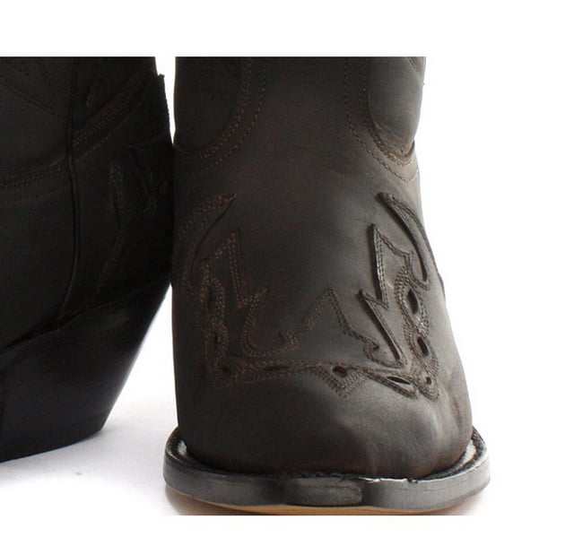 Featuring hand crafted premium leather on the brown upper and on the inner lining, this pair of boots offers a great amount of style and comfort. A high-quality detailed pattern is stitched on to the upper and a 1.5” stacked Cuban heel is introduced to compliment the high boot design. This boot was manufactured with a Grinders proprietary sole unit, that has been heat bonded to the welt using the Goodyear method, which is known for increasing the strength of the boot and ensuring durability for years to come. The sole is also fitted with a unique air cushion that allows for added flexibility and which adds to the long-lasting qualities of this boot. • Oily black leather upper • Goodyear Welted sole unit • Luxurious interior leather lining • Stacked 1.5” leather heels • Leather Soles • Made in Mexico