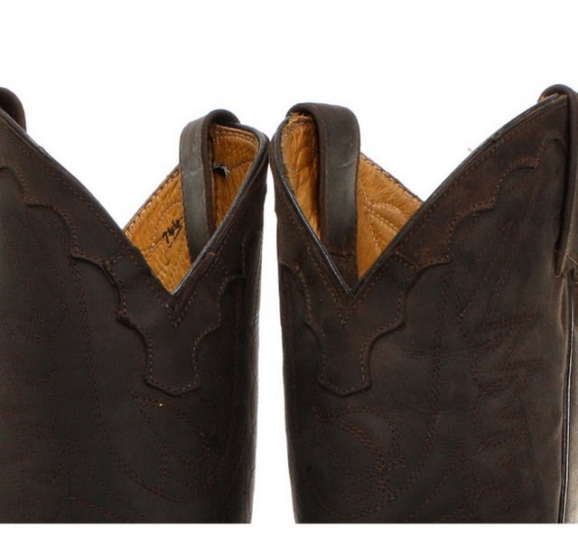 Featuring hand crafted premium leather on the brown upper and on the inner lining, this pair of boots offers a great amount of style and comfort. A high-quality detailed pattern is stitched on to the upper and a 1.5” stacked Cuban heel is introduced to compliment the high boot design. This boot was manufactured with a Grinders proprietary sole unit, that has been heat bonded to the welt using the Goodyear method, which is known for increasing the strength of the boot and ensuring durability for years to come. The sole is also fitted with a unique air cushion that allows for added flexibility and which adds to the long-lasting qualities of this boot. • Oily black leather upper • Goodyear Welted sole unit • Luxurious interior leather lining • Stacked 1.5” leather heels • Leather Soles • Made in Mexico
