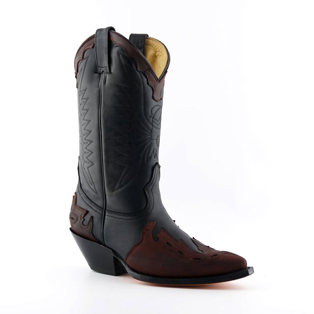Featuring hand crafted premium leather on the upper and on the inner lining, this pair of boots offers a great amount of style and comfort. A high-quality detailed pattern is stitched on to the upper and burgundy accenting panels, as well as a small block heel that compliments the high boot design. This boot was manufactured with a Grinders proprietary sole unit, that has been heat bonded to the welt using the Goodyear method, which is known for increasing the strength of the boot and ensuring durability for years to come. The sole is also fitted with a unique air cushion that allows for added flexibility and which adds to the long-lasting qualities of this boot. • Leather upper • Goodyear Welted • Luxurious interior leather lining • Stacked leather heels • Leather Soles • Made in Mexico