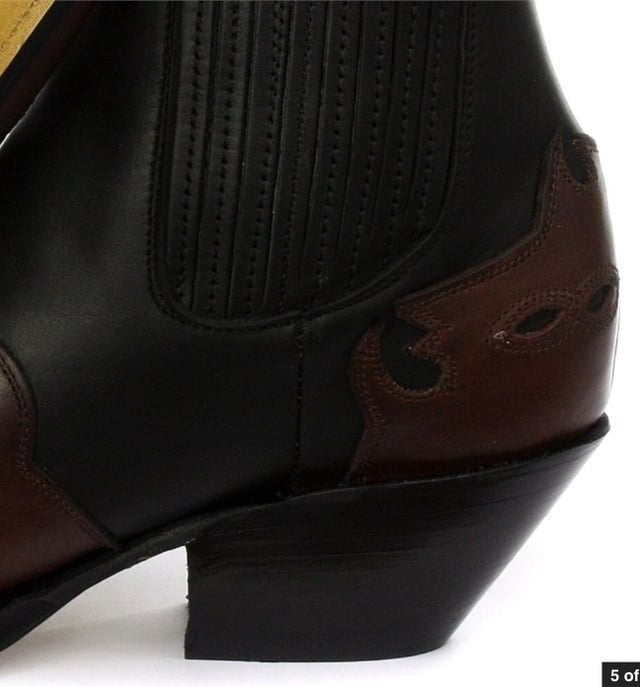 This boot is a shorter version of the Grinders ‘Arizona’ cowboy style and has been reimagined in a classic Cuban heeled Chelsea boot. The upper is made of high-quality leather and a stylish leather overlay appears on the pointed toe with a convenient elasticated gusset and pull loops implemented at the boot opening. The interior is crafted from soft leather which cushions the foot and allows for breathability. The underside of the shoe displays a stacked 1.5” heel which is built onto a durable welted leather sole that has been engraved with the iconic Grinders Bulldog logo. • Goodyear Welted • Leather upper • Soft Leather lining • Stacked leather heels • Leather Soles • Made in Mexico