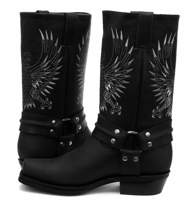 This bald eagle style pairs a vintage cowboy silhouette with an eye-catching design and imparts it upon a hard wearing and durable boot. The boot upper is crafted from leather and is embossed with a colour contrasting embroidered eagle design which is stitched onto the front and back. Additionally, a three-way ankle harness with riveted brass rings is wrapped around the boot and imbues it with extra unique quality. Other introductions to this shoe include a square toe front, comfortable leather lining, a stacked 1.5” Cuban heel and embossed branding on the outer sides. For an added durable quality, the sole of this boot is welted using the Goodyear method, which is known for providing strength and long last to shoes. • High Leg Harness Boots • Goodyear Welted sole • Shoe upper is crafted from premium leather • Features a soft leather lining • Rubber soles • Made in Mexico