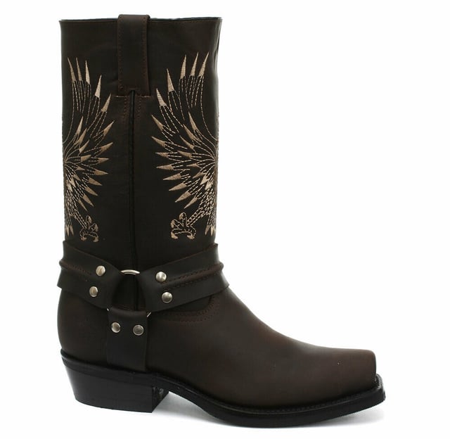 This bald eagle style pairs a vintage cowboy silhouette with an eye-catching design and imparts it upon a hard wearing and durable boot. The boot upper is crafted from leather and is embossed with a colour contrasting embroidered eagle design which is stitched onto the front and back. Additionally, a three-way ankle harness with riveted brass rings is wrapped around the boot and imbues it with extra unique quality. Other introductions to this shoe include a square toe front, comfortable leather lining, a stacked 1.5” Cuban heel and embossed branding on the outer sides. For an added durable quality, the sole of this boot is welted using the Goodyear method, which is known for providing strength and long last to shoes. • High Leg Harness Boots • Goodyear Welted sole • Shoe upper is crafted from premium leather • Features a soft leather lining • Rubber soles • Made in Mexico