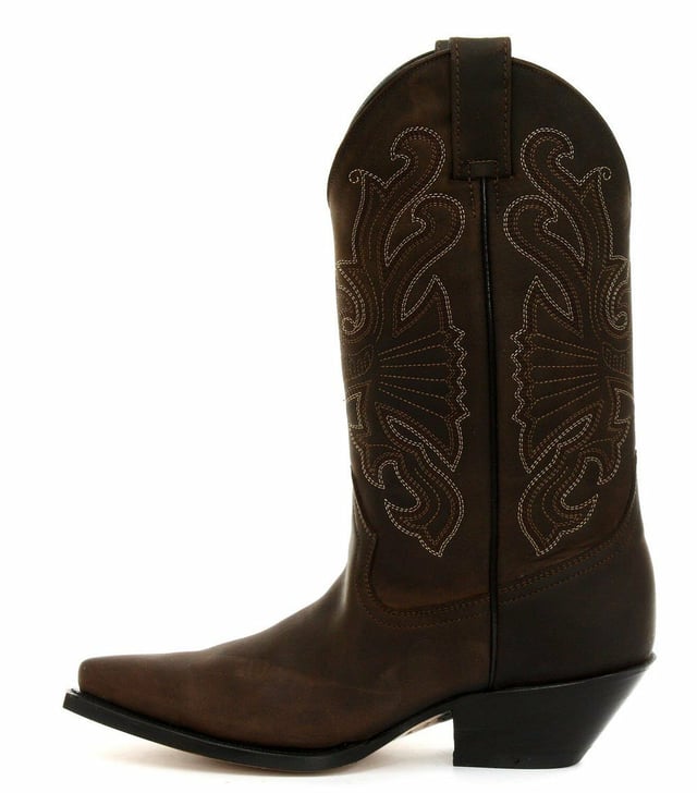 The Grinders Buffalo is a quality, hard wearing all leather western cowboy boot. This style features a brown oiled upper which is abrasion resistant for longer wear and sports a colour contrasting stitched detailed pattern on the shaft. This boot is given an iconic Western style with introductions such as a pointed toe and 2.25-inch stacked Cuban heel and is made comfortable using a full leather lining and insole. The branded genuine leather sole unit provides greater durability and the two side pull on loops makes the boots easier to put on, all of which add to the comfort and practicality of this stylish luxury Buffalo boot. • Goodyear Welted sole • Leather upper with detailed stitched design • Soft Leather lining • Stacked 2.25” Cuban heels • Leather Soles • Made in Mexico