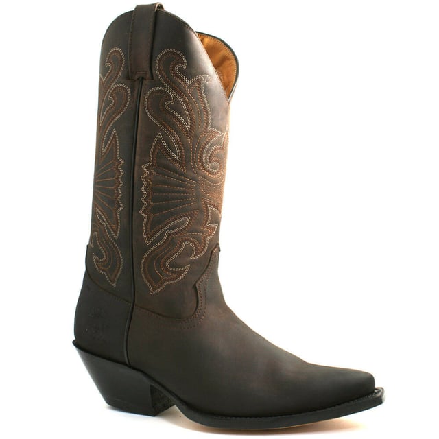 The Grinders Buffalo is a quality, hard wearing all leather western cowboy boot. This style features a brown oiled upper which is abrasion resistant for longer wear and sports a colour contrasting stitched detailed pattern on the shaft. This boot is given an iconic Western style with introductions such as a pointed toe and 2.25-inch stacked Cuban heel and is made comfortable using a full leather lining and insole. The branded genuine leather sole unit provides greater durability and the two side pull on loops makes the boots easier to put on, all of which add to the comfort and practicality of this stylish luxury Buffalo boot. • Goodyear Welted sole • Leather upper with detailed stitched design • Soft Leather lining • Stacked 2.25” Cuban heels • Leather Soles • Made in Mexico