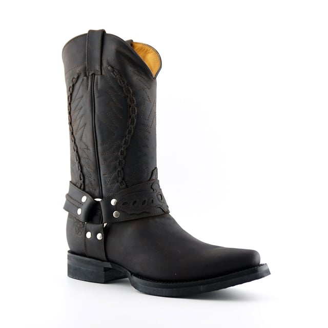 These calf length boots feature a decorative weaved pattern which is stitched onto the upper panel giving this piece a great distinctive character. Additionally, the boot features a sophisticated pointed two as well as 1.5” heels and an additional two pull loops at the sides for easy slip on. This boot was manufactured with a grippy rubber outsole, that has been heat bonded to the welt using the Goodyear method, which is known for increasing the strength of the boot and ensuring durability for years to come. The sole is also fitted with a unique air cushion that allows for added flexibility and which adds to the long-lasting qualities of this boot. • Goodyear Welted • Leather upper • Two pull loops to sides for easy slip on • Luxurious interior leather lining • Rubber Soles • Made in Mexico