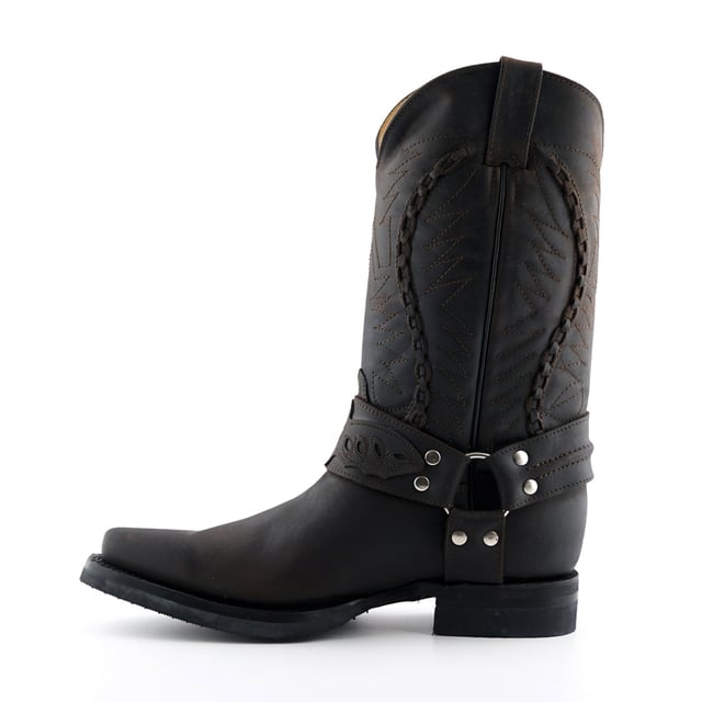 These calf length boots feature a decorative weaved pattern which is stitched onto the upper panel giving this piece a great distinctive character. Additionally, the boot features a sophisticated pointed two as well as 1.5” heels and an additional two pull loops at the sides for easy slip on. This boot was manufactured with a grippy rubber outsole, that has been heat bonded to the welt using the Goodyear method, which is known for increasing the strength of the boot and ensuring durability for years to come. The sole is also fitted with a unique air cushion that allows for added flexibility and which adds to the long-lasting qualities of this boot. • Goodyear Welted • Leather upper • Two pull loops to sides for easy slip on • Luxurious interior leather lining • Rubber Soles • Made in Mexico